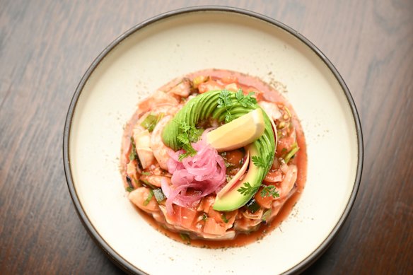 Ceviche with prawns, octopus and mussels, ready to be piled onto tortilla chips.