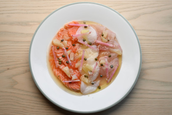 The pretty raw crudo plate with salmon, Abrolhos scallops and kingfish.