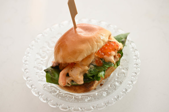 Lobster in a tiny buttery roll.