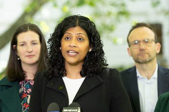 Greens leader Samantha Ratnam, centre, with Melbourne MP Ellen Sandell and federal party leader Adam Bandt.