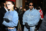 Double denim has Kanye West spreading love in Paris at the Kenzo show, with girlfriend Julia Fox.