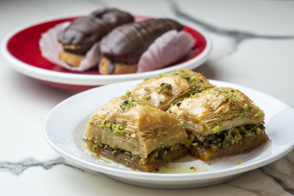 Baklava (front) and chocolate eclairs.