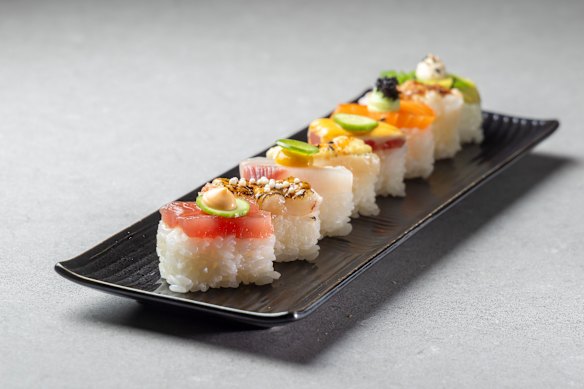 Hako sushi is pressed in a wooden box and sliced into blocks.