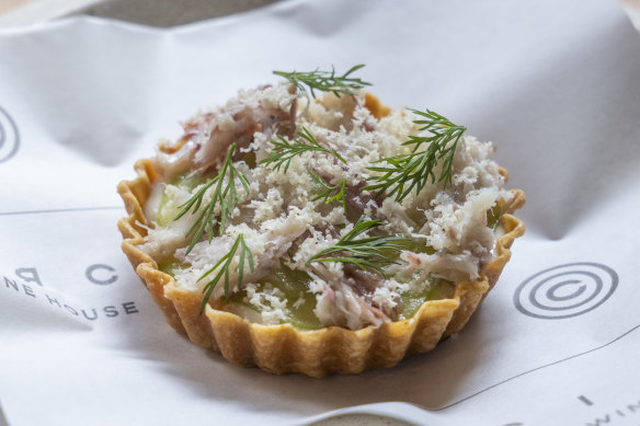 Smoked eel is tempered by fresh dill and cucumber in a tiny, elegant tart. 