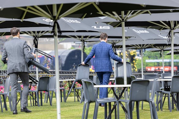 Punters arrange where they shall sit.