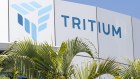 Tritium has closed its Brisbane factory and consolidated its operations in the United States to ensure its financial survival.