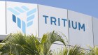 Tritium has closed its Brisbane factory and consolidate its operations in the United States to ensure its financial survival.