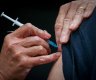 ‘Seems like a lifetime away’: readers respond to vaccination targets to open up Australia