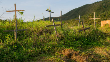 Crosses mark the lives lost at Bento Rodrigues.