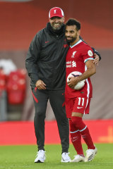 Liverpool manager Jurgen Klopp with  striker  Mohamed Salah.