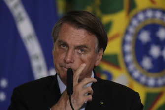 Under pressure: Brazilian President Jair Bolsonaro on Tuesday.