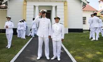 Navy recruits Rahal Dergham and Raine Alexa Dela Cruz in their ceremonial uniform at the HMAS Cresswell.