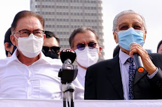 Anwar Ibrahim and Mahathir Mohammed join forces on Monday to call for Prime Minister Muhyiddin Yassin to resign.