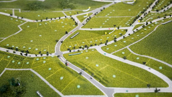 A model of the new Bento Rodrigues on display in a visitors' area at the construction site.