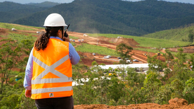 A Renova worker overlooks the new Bento Rodrigues site from a recently built lookout. 