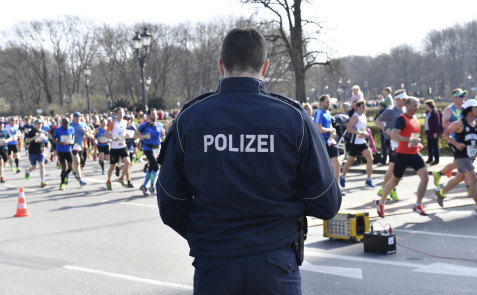 Police patrol the Berlin half-marathon on Sunday.