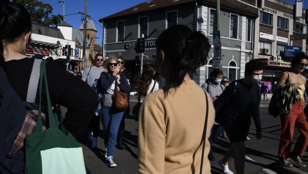 Health authorities have recommended people return to mask-wearing where social distancing is not possible.