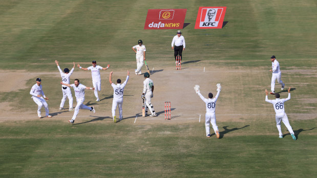 England celebrates the final wicket in their win over Pakistan in the second Test in Multan.