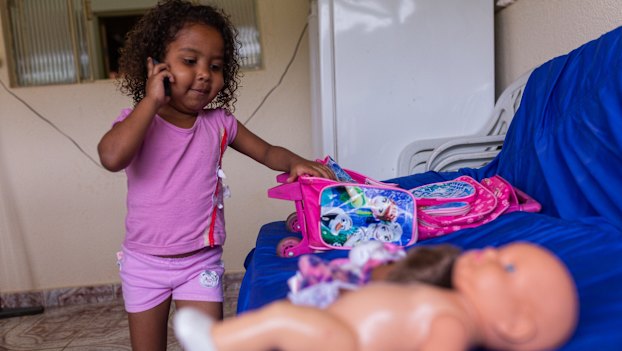Four-year-old Sofya Marques, of Barra Longa, has been unwell since coming into contact with the tailings mud. Her mother, Simone, now an activist, has found it hard to make ends meet.