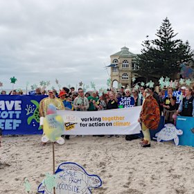 A group gathered at Cottesloe Beach to protest the Browse Gas project.
