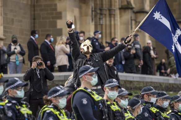 Police during the anti-lockdown protests at Melbourne’s CBD on Saturday. 