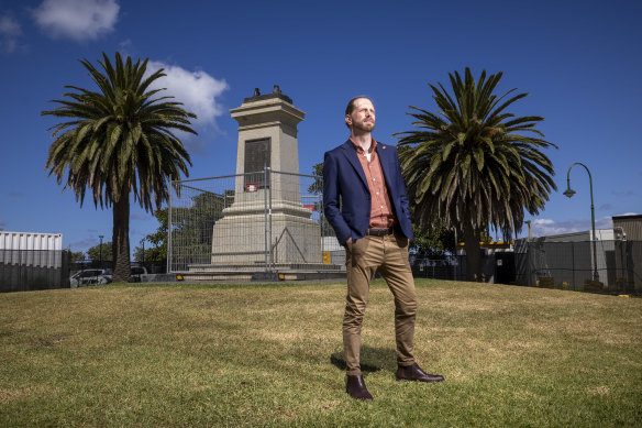 Port Phillip councillor Robbie Nyaguy at the site of the vandalised Captain Cook statue in Catani Gardens.
