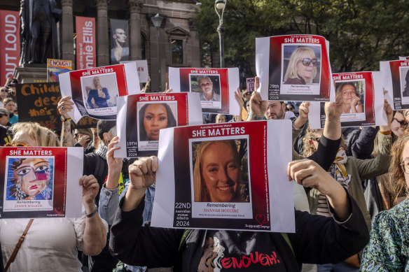 Protesters at Melbourne’s No More anti-violence rally at the weekend hold placards of women who were killed in alleged incidents of gender-based violence.