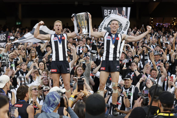 Billy Frampton and Darcy Cameron of the Magpies celebrate.