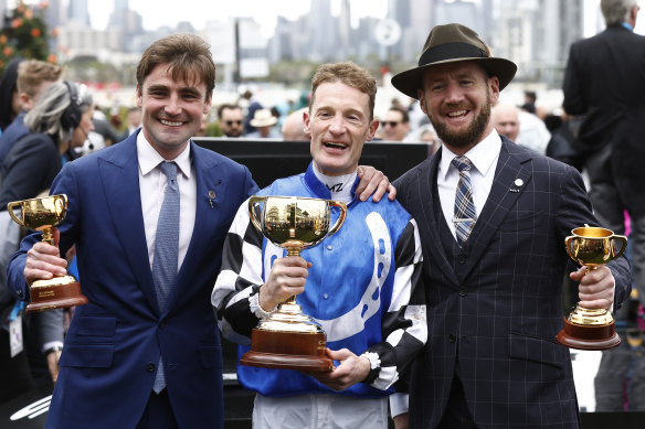 Trainers David Eustace (left), Ciaron Maher and jockey Mark Zahra won the 2022 Melbourne Cup with Gold Trip.