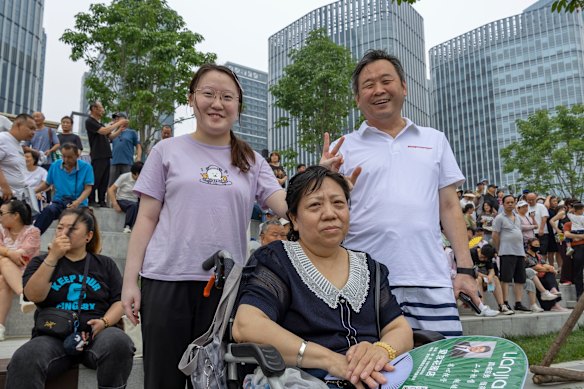 Zhang Yuxin, 19, with her family at the Dragon Boat Festival on Beijing’s Grand Canal. 