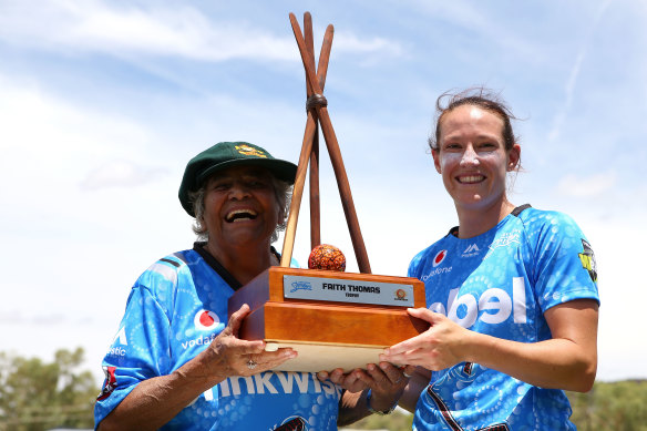 Megan Schutt with Faith Thomas at a WBBL match in Alice Springs in 2018.