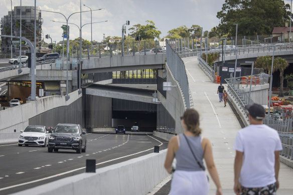 Cars exit one of the tunnels from the Rozelle interchange on Sunday.
