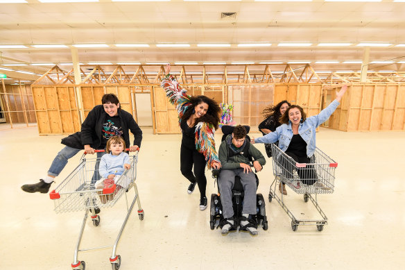 The old Coles in Coburg will become the new home of arts organisation Schoolhouse Studios. Artists (L-R) Alice Glenn, daughter Wanda, Grace Dlabik with son Elijah and Fiona Figliomeni and Hollie Fifer.