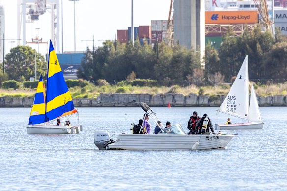 Searching for drones in the Yarra after hundreds fell ahead of the soccer match at Marvel Stadium in 2023.