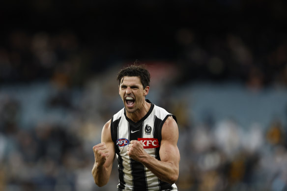 Scott Pendlebury celebrates on the final siren.