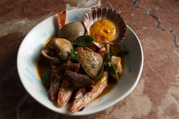 Grilled king prawns bouillabaisse.