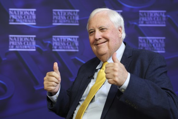 Clive Palmer, Trumpet of Patriots chairman and party spokesperson, poses for cameras ahead of an address to the National Press Club.