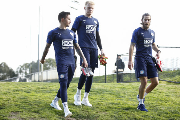 Josh Brillante (right) at City training on Wednesday with teammates Jamie Maclaren and Tom Glover.