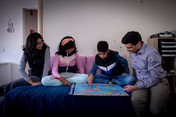 Somisha (far left) and Adeerus Ghayur with their daughter Zarisha, 10, and son Zeerus, 12, at home in the Latrobe Valley.