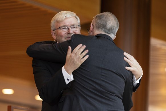 Former Prime Minister Kevin Rudd is embraced by Prime Minister Anthony Albanese during the unveiling of his official portrait last year.