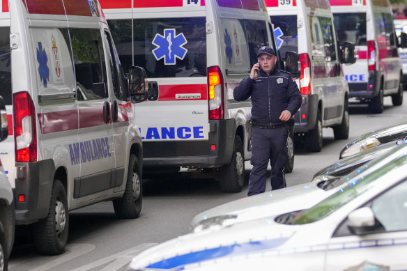 Police block the street around the Vladislav Ribnikar school in Belgrade, Serbia, on Wednesday. 