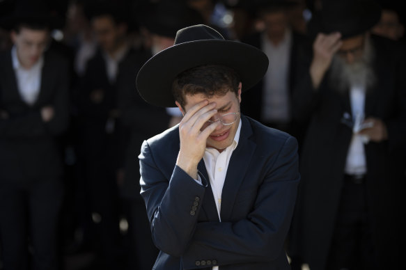 A mourner at the funeral of one of the stampede victims on Friday.