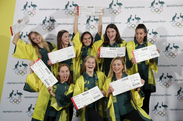 The Australian artistic swimming team with their tickets to Tokyo on Wednesday.