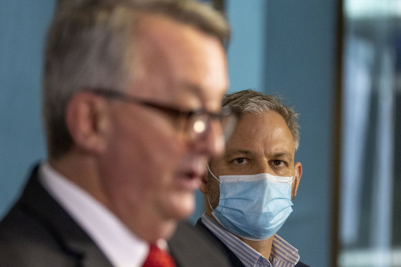 Victoria’s Chief Health Officer Brett Sutton (right) at one of the daily news conferences.