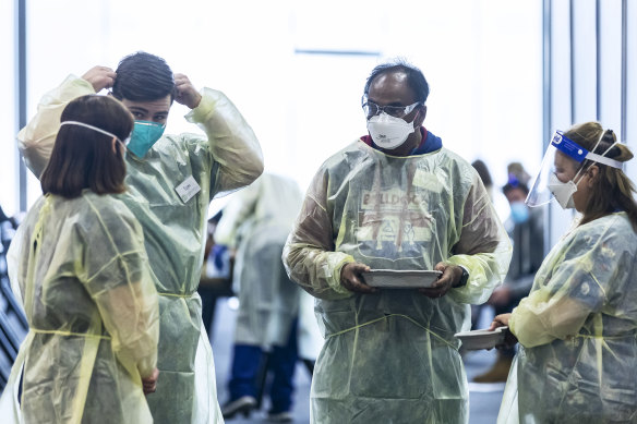 Dr Mukesh Hakerwal (second from right) with other health workers last year. 