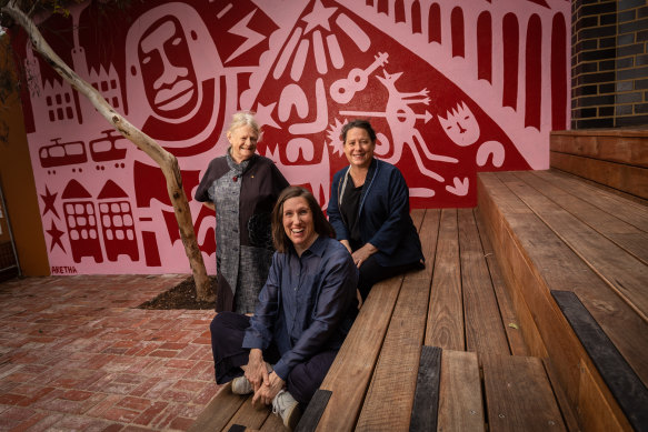 Three years on from a massive fire, La Mama has reopened, to the delight of (left to right) co-artistic directors Liz Jones and Caitlin Dullard and architect Meg White.