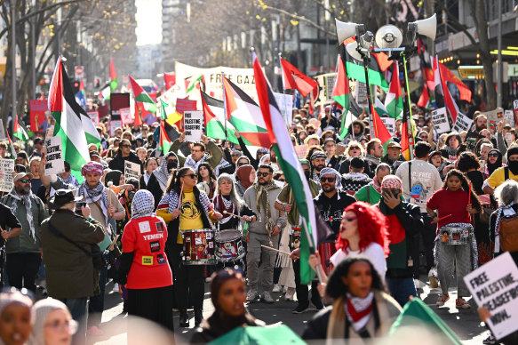 Demonstrators walk through Melbourne’s CBD during a pro-Palestine rally in Melbourne last month.