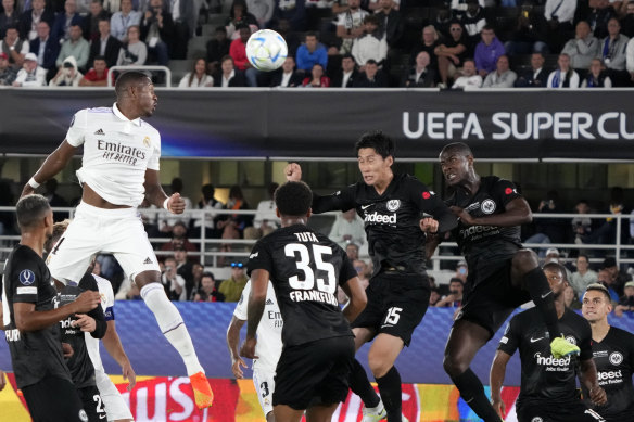 Real Madrid goalscorer David Alaba soars above the Frankfurt defence in Helsinki.