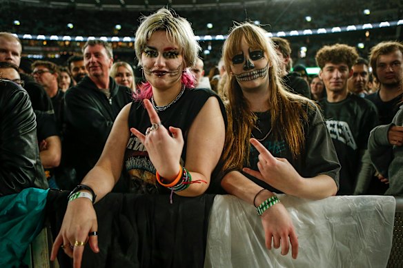 Metallica fans Daphne Gattari (left) and Paige Scott prepare for the US heavy metal band’s performance at Marvel.