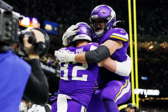 Kyle Rudolph (left) and Brian O'Neill celebrate after the former's match-winning touchdown in Louisiana.